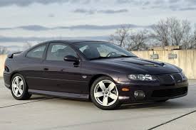 Image result for Dark Otter Gray 2004 Pontiac