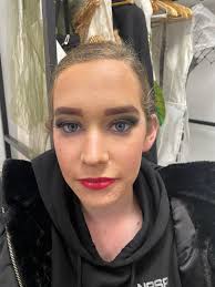 St Josephs Art club Year 10/11's Art Teacher Julia Goodlad Mentor Ashley  Whiting Behind the Screen Modelled by Cassandra Swarbrick designed and made  by Emily Larham and Emilie Speldewinde Fabrics used cardboard