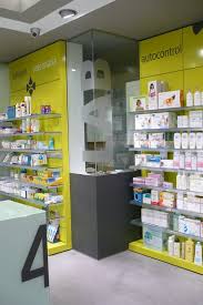 Pin By Ghala Al Oyoun On Pharmacy Interior Pharmacy Design Supermarket Design Grocery Store Design