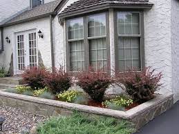 Houzz has millions of beautiful photos from the world's top designers, giving you the best design ideas for your dream. Landscaping In Front Of The Bay Window I Like The Colors Here Front Yard Landscaping Simple Front House Landscaping Bay Window Landscaping