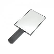 A two way mirror usually is a quarter inch of glass, a 1 micron layer of silver and then a quarter inch of dark glass. Chanel Chanel Black Large 2 Way Hand Mirror
