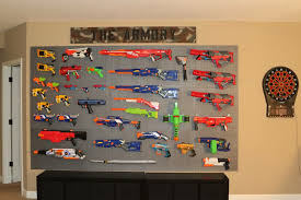 Hang a wire rack on your wall using screws, anchors, or other attachments depending on the wall material. Pin On Nerf Wall