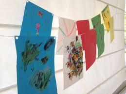 Add streaks to each banner piece with dina wakley paints in apricot, heather, aloe, sand, and mineral. Tibetan Prayer Flags An Inspiring Craft For Kids