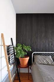 We did not find results for: A New Twist On The Matte Black Trend This One On Your Walls Wood Panel Walls Modern Wood Paneling Vertical Wood Paneling