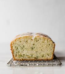 This Delicious Lemon Zucchini Bread Recipe Is Loaded With Fresh Lemon Zest And Grated Zucchini Then Topped Wi Lemon Zucchini Lemon Recipes Lemon Zucchini Bread