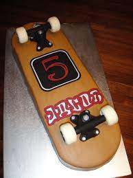 My son really wanted a skateboard cake for his 7th birthday! Skateboard Cake Skateboarding Skateboard Cake Bmx Cake Cupcake Cakes