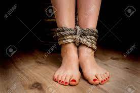 Female Legs Tied With Rough Rope - Violence Concept Stock Photo, Picture and  Royalty Free Image. Image 74153982.