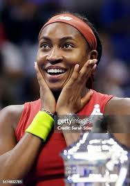 Coco Gauff of the United States celebrates with the trophy after... News  Photo