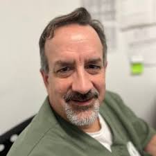 Dr. Elmer Jason Grande, MD