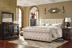 A beautiful wing bed design is complimented by hand applied. Willenburg Queen Upholstered Sleigh Bed Ashley Furniture Homestore