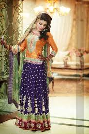 Purple Orange Mehndi Mayon Lehnga Choli To Order Email Us At Order Urbancoutureclub Com For More D Indian Bridal Fashion Pakistani Dresses New Fashion Saree