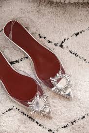 On average, the shoes retail for $700 and upwards. Amina Muaddi Begum Embellished Heels Designer Shoe Dupe Mademoiselle A Minimalist Fashion Blog