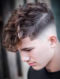 The slightly longer hair on the top of the head shows off the movement and body of this naturally curly hair, while the shorter sides give it a clean and sleek look that is undeniably trendy and modern. 50 Modern Men S Hairstyles For Curly Hair That Will Change Your Look