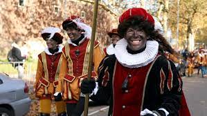 The dutch tradition of black pete typically sees a white person wearing full blackface, an afro wig, red lipstick and earrings, and is often part of the netherlands' st. America S First Cultural Export Blackface Remains Global Problem