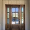 You can have an arched or rectangular transom and sidelights on one or both sides of your door. 1