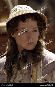 KRISTEN BELL in DEADWOOD, 2004, directed by ALAN TAYLOR, DAVIS GUGGENHEIM, EDWARD  BIANCHI, MICHAEL ALMEREYDA and WALTER HILL. Copyright HBO.