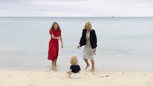 Despite, at 33, being the youngest spouse at the g7 summit next week the new mrs johnson's choice of outfits shows intent beyond her years and experience. G7 Carrie Johnson Treats Spouses To Steak Firepits And Brie On The Beach Bbc News