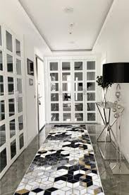 Çeşitli markalara ait kaymaz yolluk modelleri; Babil Home Beyaz Petek Desen Jel Kaymaz Tabanli Yolluk Bhj850 Fiyati Yorumlari Trendyol