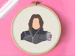 This is a funny cross stitch pillow done in brown. White Raven Cross Stitch Club Is Creating Cross Stitch Patterns Tutorials Patreon In 2021 Marvel Cross Stitch Cross Stitch Cross Stitch Patterns