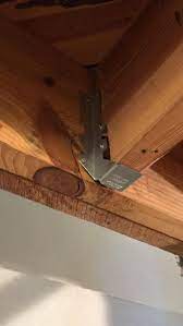 Mini joist hangers are used for light duty applications such as trimmers, ceiling joists, decking, studs and smaller timbers. How To Fix Joist Hangers Where Joist Is Not Fully On Seat Of Hanger Home Improvement Stack Exchange