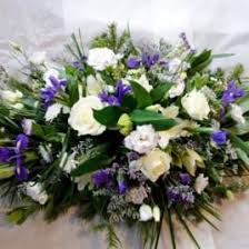 If you're looking for something different to send for a funeral other than the standard white rose and red rose standing sprays, there are many different options online to pick from. Blue White Funeral Spray Patty S Flowers
