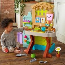 I think my grandma had this one for us to play with at her house. Fisher Price Laugh Learn Grow The Fun Garden Play Kitchen Dealmoon