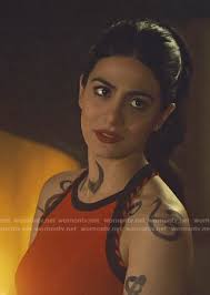 WornOnTV: Isabelle's red top with black trim