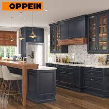 An elegant cabinet design project will entail a lot of attention to detail, in combining with elegance and beauty in style. China Oppein Traditional Thermofoil Navy Blue Kitchen Cabinets China Blue Kitchen Cabinets Thermofoil Kitchen Cabinets
