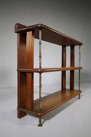 Bookcases are used in private homes, public and university libraries, offices and bookstores. English 1930 S Teak Brass Campaign Style Shelves 578000 Sellingantiques Co Uk