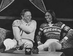 Movies from the 20s - 60s - Frank Sinatra with fellow entertainer Dionne  Warwick at a ski resort in Lake Tahoe, California. The two later performed  together at Warwick's hour-long special in