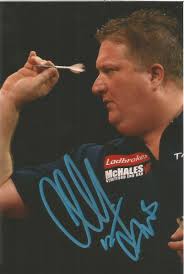 DARTS: COLIN LLOYD 'JAWS' SIGNED 6x4 ACTION PHOTO+COA