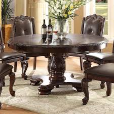 Onto circle dining tables where the form softens and along with it, the atmosphere in the room. Crown Mark Kiera Traditional Round Dining Table Royal Furniture Kitchen Tables