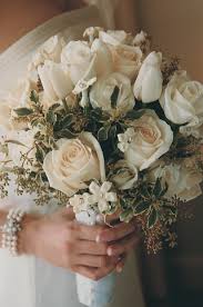 Here, we display some of the best tulip wedding bouquets that we've come across, and point out how they've been used. Bouquets Photos Ivory Tulip And Rose Bridal Bouquet Inside Weddings