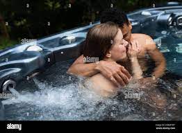 Couple hugging in tub hi-res stock photography and images - Alamy