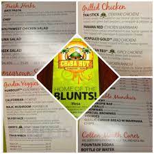 Here Is A Picture Of The Menu For Cheba Hut On The Front Of It Is The Logo Of A Little Hut On An Island With Stuffed Green Peppers Pickled Olives