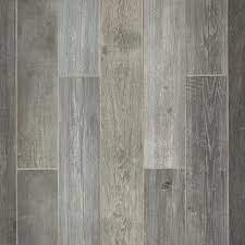 Wood look tiles are the ideal solutions for those who want the elegance of the parquet, but with the performance of traditional porcelain tiles. Woodhaven Grey Wood Plank Porcelain Tile 6 X 40 100559103 Floor And Decor