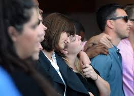 Mourners remember Tim Egkan at vigil