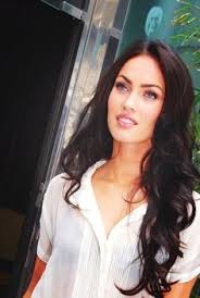 Megan S Dark Curly Hair Is Sure To Turn Head S This Spring Her Dark Brown Locks Bring Life To Her Gorgeous Blue Eyes If You Megan Fox Hair Hair Hair Styles