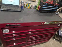 How do all of us keep the top mat clean all it dose is collect dust I've  scrubbed it and cleaned it and 30 min later looks dusty again