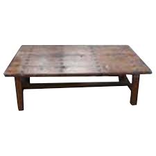 This wood coffee table comes in a thoroughly weathered finish with dark metal corner brackets and x sides. Chinese Antique Furniture Wooden Coffee Table China Coffee Table Table