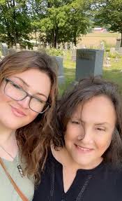 Women buying land in Ohio for camper