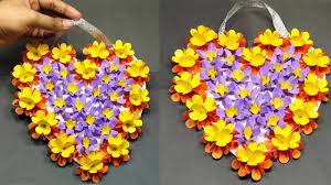 Maybe you would like to learn more about one of these? Diy Paper Heart Wall Hanging Easy Paper Flower Wall Decoration Ideas Paper Flowers Craft Paper Flowers Flower Wall Decor