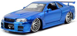Nissan skyline r35 nissan gtr r35 skyline gt 20 inch wheels modified cars godzilla racing full body matte black. Amazon Com Jada Toys Fast Furious 1 24 Brian S 2002 Nissan Skyline Gt R R34 A Die Cast Car Toys For Kids And Adults Blue 97173 Toys Games