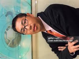 26-year-old Lee Wing-kei , a football commentator for a sports... News  Photo