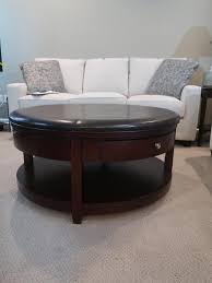 Enoki round coffee table in calacatta marble & antique brass frame. Round Leather Top Coffee Table W Pull Outs Wheels Reeds Auction Company