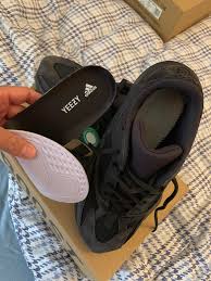 Yeezy slides resin real vs fake comparison video helped! Did Stockx Sell Me Fake Yeezy 700 Utility Blacks No Ortholite Insole And No Multi Holed Layer Between Insole And Boost Stockx