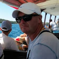 Angus Young with his wife and his bodyguard