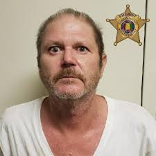 HOMICIDE ARREST] On Wednesday, July 22 a body was found with a gunshot  wound in the Tennessee River at Bluff City Landing. The Morgan County  Sheriff's Criminal Investigation Division worked around the