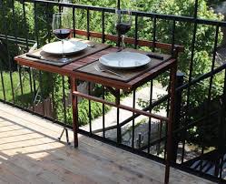 Balcony furniture season is underway. Creative Outdoor Accessories To Hang From Your Balcony Railing Small Balcony Design Balcony Design Foldable Table