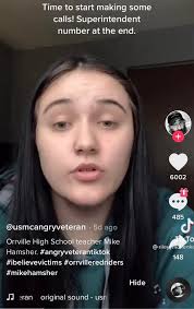 The teacher is working from home as the district and police investigate  complaints by students of "unwanted physical contact."